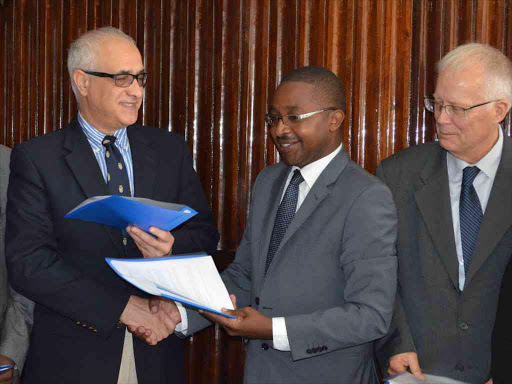 Murang'a governor Mwangi wa Iria after signing the MOU with Agha Khan CEO Shawn Bolouki at the Murang'a county government headquarters in Murang'a town.