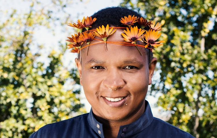 Fashion journalist Malibongwe Tylie loves the simplicity of the flower crown Alwijn Burger created for him.