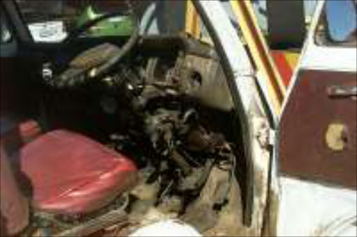TOTAL WRECK: This so-called taxi, with not a single mechanical part working, transports people daily between Bekkersdal and Westonaria on the West Rand. Pic. Peter Mogaki. 07/05/07. © Sowetan.