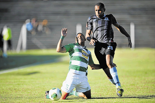 OUT ON A LIMP: Ashley Hartog of Maritzburg United, right, is one of three United players who are still undergoing therapy in the hope of being in the team to take on Orlando Pirates tonight Picture: