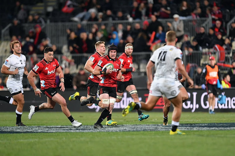 Matt Todd of the Crusaders charges forward during the Super Rugby Qualifying Final match between the Crusaders and the Sharks at AMI Stadium on July 21, 2018 in Christchurch, New Zealand.