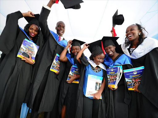 Power to read: Graduands from Mount Kenya University celebrate during the eighth graduation ceremony at the Thika Campus