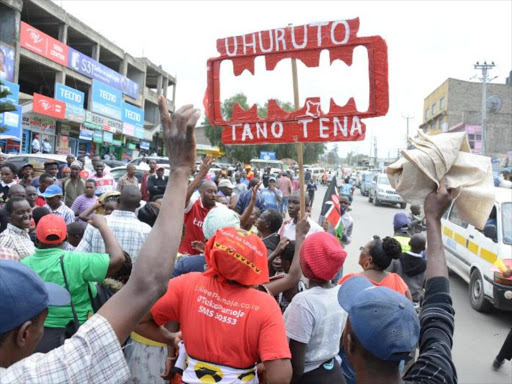 Naivasha residents celebrate after the Supreme Court upheld President Uhuru Kenyatta’s win in the October 26th presidential elections on Monday, November 20, 2017. /GEORGE MURAGE