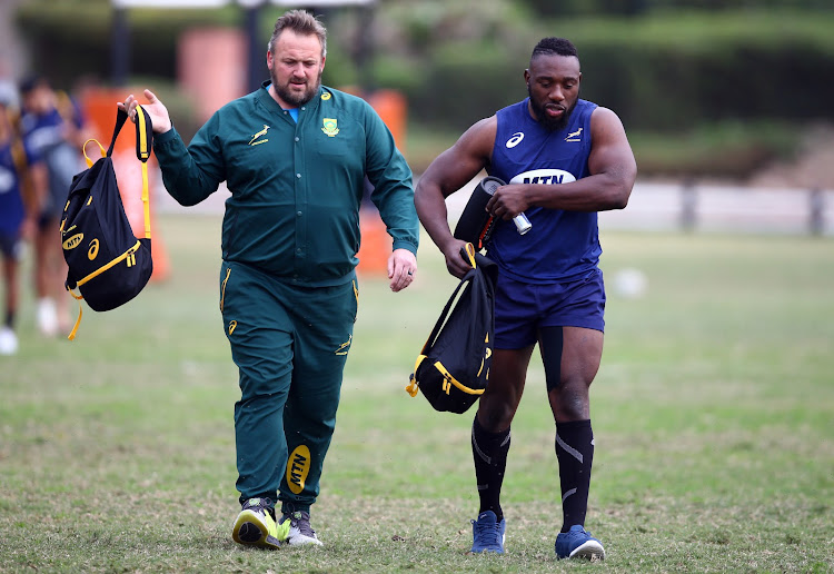 The Springboks assistant coach Matt Proudfoot arrives at South Africa training session along with front row forward Tendai "Beast" Mtawarira at Jonsson King's Parkin Durban, South Africa on August 14 2018 .