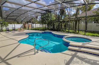 Soak up the sun on your own private southeast-facing pool deck at this Davenport vacation villa