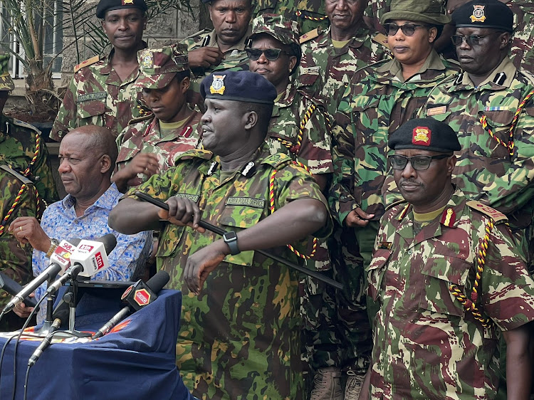 Nairobi Police commander Adamson Bungei and a team of security officers addressing the press on Sunday, March 18, 2023.