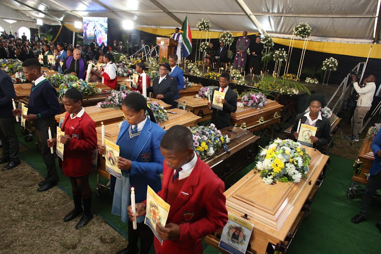 Mourners at the mass funeral of 21 teenagers who died at in the Enyobeni tavern tragedy.