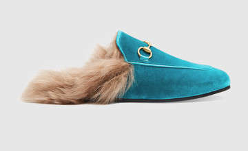 Net-a-Porter’s best-selling shoe is this shearling-lined velvet slipper by Gucci