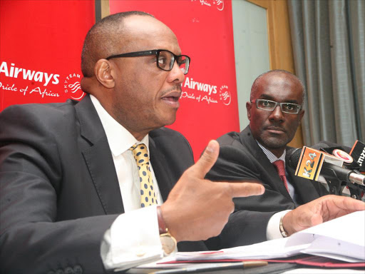 Former Kenya Airways finance director Alex Mbugua with managing director Mbuvi Ngunze during the investor briefing In Nairobi on July 30, 2015. /ENOS TECHE