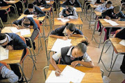 Gearing up for the future:
       Pupils write exams at a school in Randfontein, west of Johannesburg.
      
      
      
      PHOTO: DANIEL BORN