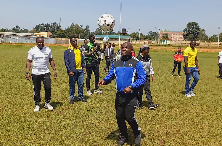 Kakamega Governor Fernandez Barasa displays his football skills at Bukhungu Stadium