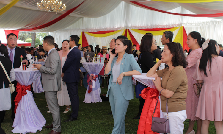 Delegates attending 74th anniversary of the founding of the Peoples Republic of China at the embassy headquarters in Nairobi on September 27, 2023.