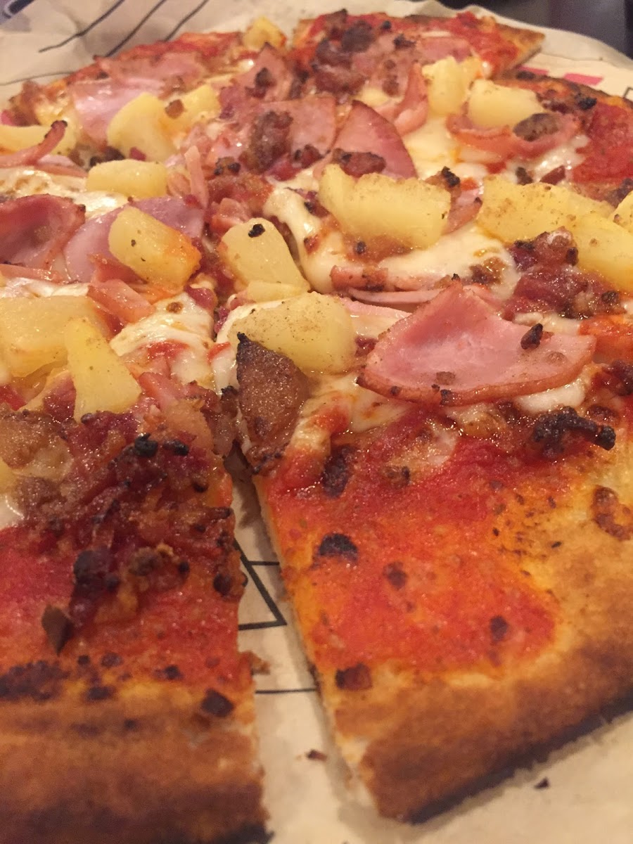 Hawaiian pizza sprinkled with a cinnamon sugar oh my yummy! The crust was great too!