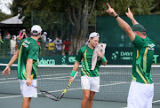 A file photo of Team captain, Marcos Ondruska (R) celebrating with Ruan Roelofse (L) and Dean O'Brien of South Africa after they won against Mike Scheidweiler and Ugo Nastasi (LUX) in the doubles during day 2 of the Davis Cup Tie between South Africa and Luxembourg at Irene Country Club on March 5, 2016 in Pretoria, South Africa.