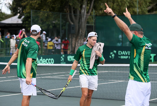 A file photo of Team captain, Marcos Ondruska (R) celebrating with Ruan Roelofse (L) and Dean O'Brien of South Africa after they won against Mike Scheidweiler and Ugo Nastasi (LUX) in the doubles during day 2 of the Davis Cup Tie between South Africa and Luxembourg at Irene Country Club on March 5, 2016 in Pretoria, South Africa.