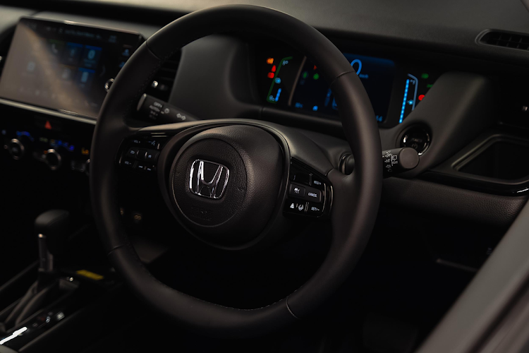 The interior benefits from a wireless charging pad.