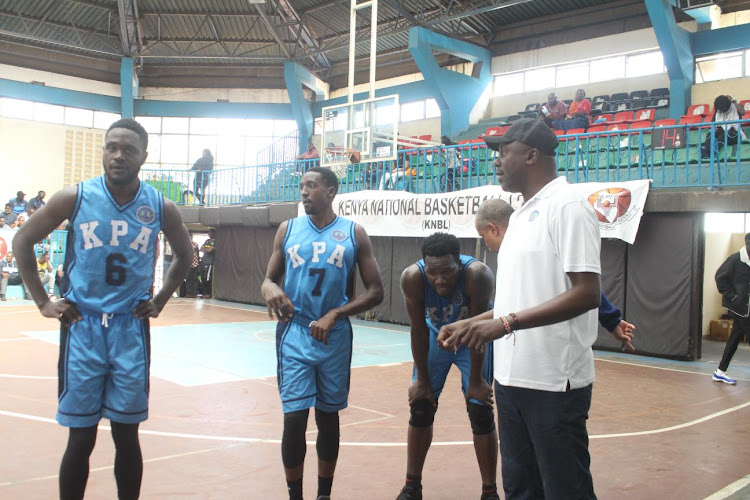 KPA players with their coach Cliff Owuor at Nyayo stadium