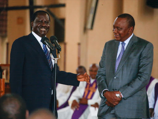 President Uhuru Kenyatta with former Prime Minister Raila Odinga during the late Mzee Jomo Kenyatta's 38th Anniversary Memorial Service./PSCU