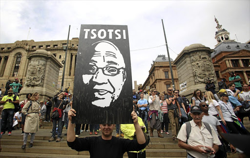 VILLAINY ABROAD: A man makes his feelings known at the big anti-Zuma march in Church Square, Pretoria, on Friday 7 April 2017.