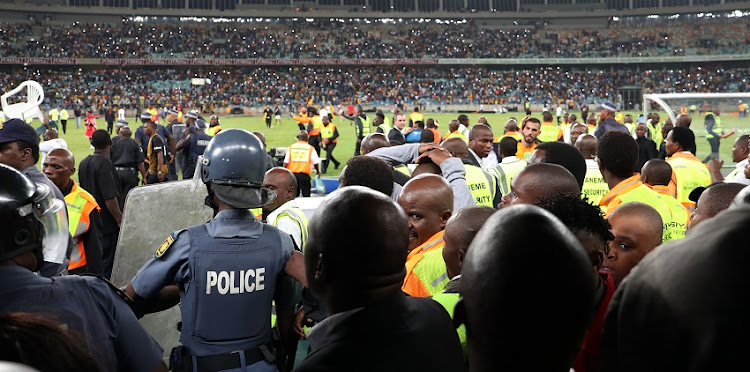 Fans vandalizing the stadium during the 2018 Nedbank Cup match between Kaizer Chiefs and Free State Stars at Moses Mabhida Stadium, Durban on 21 April 2018.