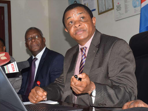 KRA commissioner for domestic tax department Benson Kerongo with commissioner general John Njiraini at a media briefing in Nairobi on July 27 /FILE