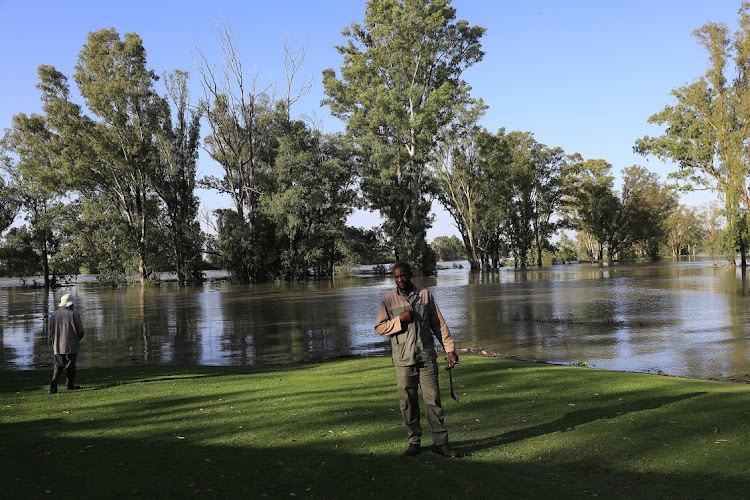 Benjamin Runganga at the Bloemhof Golf Club, where a large area is under water.