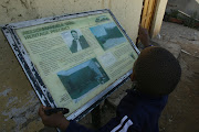 A child  visits the home of former president Nelson Mandela in Alexandra‚ Johannesburg.
