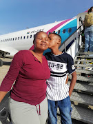 Precious Thebe and her son Kgosi, who was barred from going inside MSC Splendida. 
