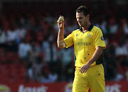 Shaun Tait of Australia looks on during the 2011 ICC World Cup match between Australia and Canada at  M. Chinnaswamy Stadium on March 16, 2011 in Bangalore, India