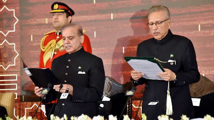 Pakistan's President Arif Alvi administers the oath to Pakistan's newly elected Prime Minister Shehbaz Sharif, at the Presidential Palace in Islamabad, Pakistan March 4, 2024.