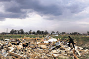 Lenasia Extension 13 residents feel done over by the Gauteng housing department after their homes were reduced to rubble Picture: ALON SKUY