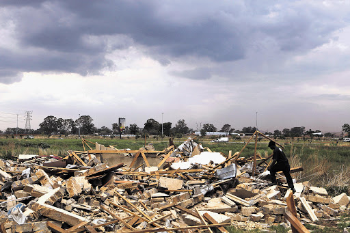 Lenasia Extension 13 residents feel done over by the Gauteng housing department after their homes were reduced to rubble Picture: ALON SKUY