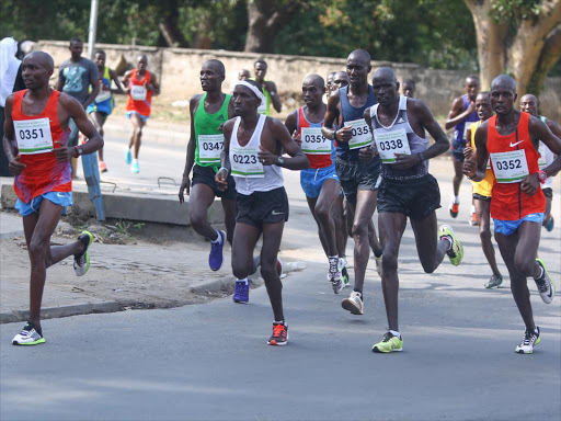 Paul Maina, (0351), the winner of Mombasa International marathon in the lead during the race in Mombasa city. Paul emerged the winner in 42 kilometers men category race in 2:12:50.g.xcentre