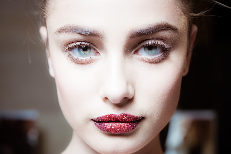Make a sultry statement with a glitter lip.