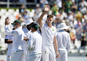 Morne Morkel of South Africa celebrates the wicket of Shaun Marsh of Australia and taking 300 wickets during day 2 of the 3rd Sunfoil Test match between South Africa and Australia at PPC Newlands on March 23, 2018 in Cape Town, South Africa. 