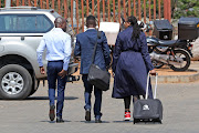 Jackie Phamotse, right, who posted a defamatory tweet in June 2018 about Romeo and Basetsana Kumalo, leaves the Randburg magistrate's court on September 19, 2023 after being found guilty on four charges.  