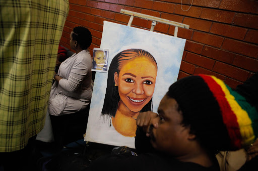 Mourners arrive at the memorial for Karabo Mokoena in Diepkloof, Soweto. The 22 year olds body was found after being set alight in Lyndhurst, Johannesburg.