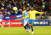 Mamelodi Sundowns utility defender Motjeka Madisha (R) will be pleased with some game time after struggling to nail down a regular place in the team last season.  