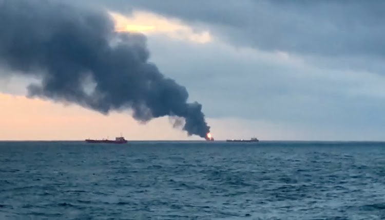 Smoke rises from a fire at a ship in the Kerch Strait near Crimea January 21, 2019 in this still image taken from Reuters TV footage.