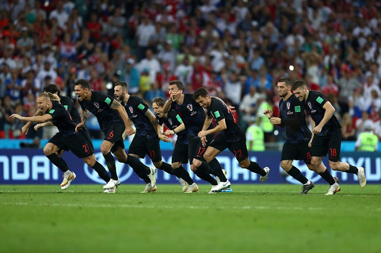 Croatia players celebrate winning the penalty shoot out during the 2018 FIFA World Cup Russia Quarter Final match between Russia and Croatia at Fisht Stadium on July 7, 2018 in Sochi, Russia.