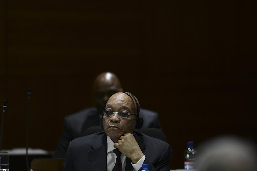 President Jacob Zuma listens during a debate at the official opening of the National House of Traditional Leaders at the Tshwane Metro Council Chamber in Pretoria