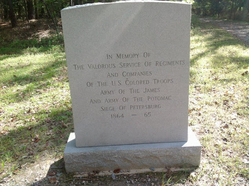 IN MEMORY OF THE VALOROUS SERVICE OF REGIMENTS AND COMPANIES OF THE US COLORED TROOPS ARMY OF THE JAMES AND ARMY OF THE POTOMAC SIEGE OF PETERSBURG 1864 - 65