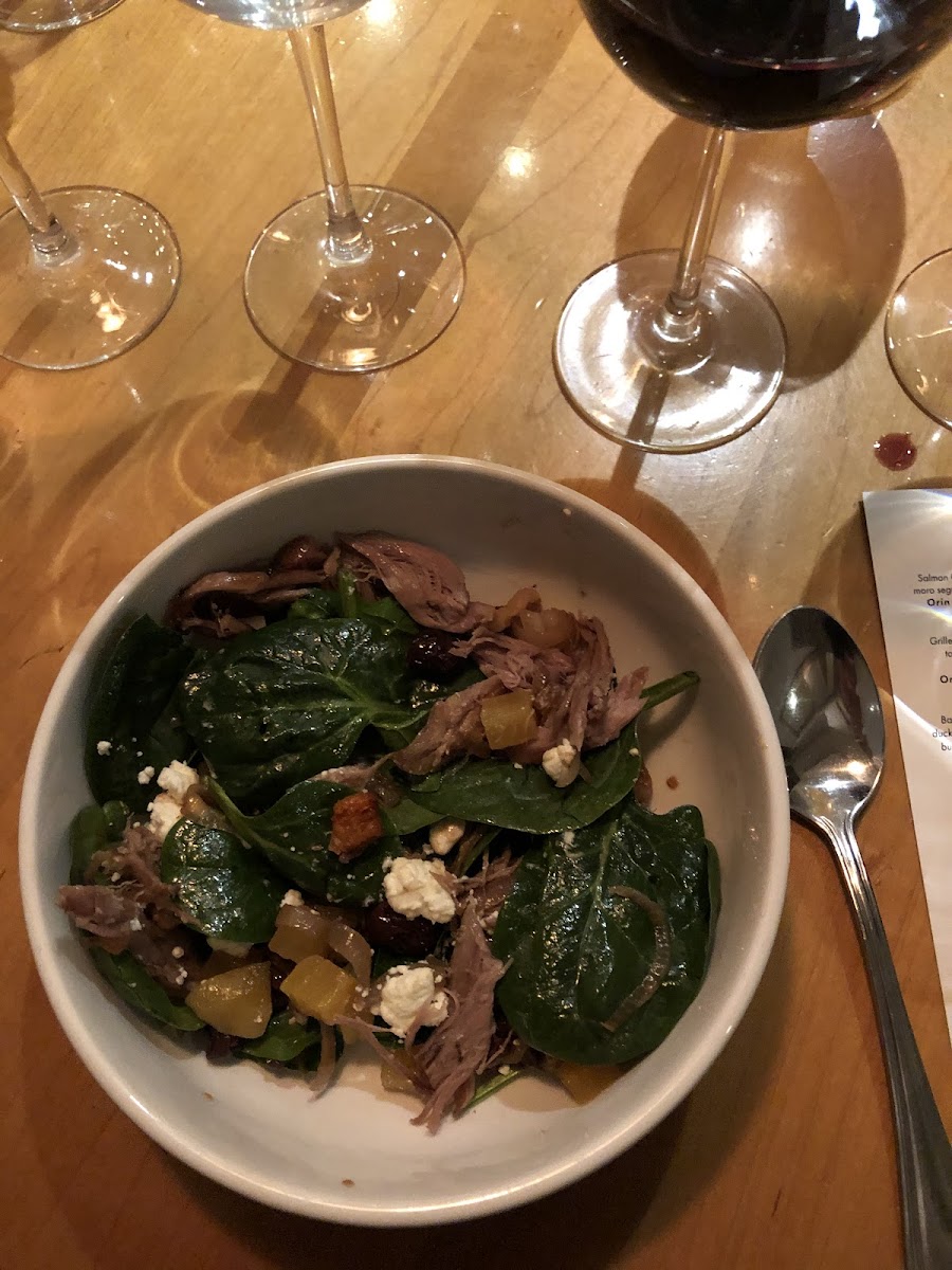 Baby chard and spinach with goat cheese, butternut squash, and duck prosciutto