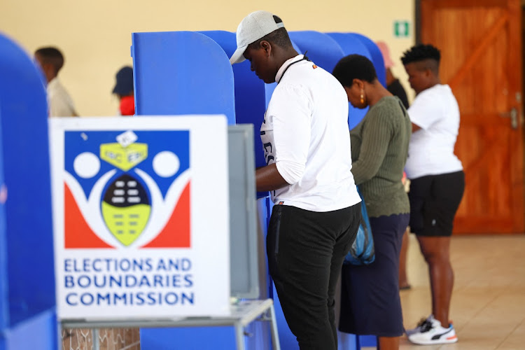 Voters complete ballots at a polling station during Eswatini's parliamentary elections in Mbabane on September 29 2023. Picture: REUTERS/ESA ALEXANDER.