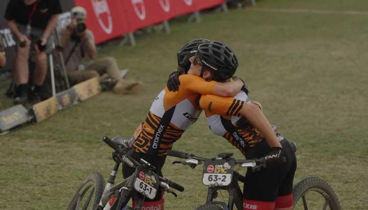 The Ghost Factory Racing team of Anne Terpstra of the Netherlands and Nicole Koller of Switzerland celebrate wining their eighth straight stage in Sunday's Grand Finale of the Absa Cape Epic to take the overall title in the women’s race at the finish at Coetzenburg Athletics Stadium in Stellenbosch on Sunday.