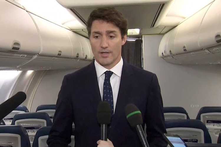 Canada's Prime Minister Justin Trudeau apologises for wearing brown-face makeup in 2001, to reporters on the Liberal party leader's election campaign jet in Halifax, Nova Scotia, Canada in a still image from video September 18, 2019.