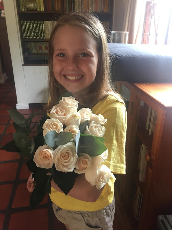 Rachel Ancer, on the third anniversary of her bone marrow transplant, on 14 March 2020. The SA Bone Marrow Registry's Terry Schlaphoff had sent her the roses to mark the milestone.