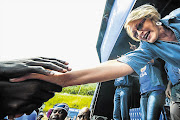 REACHING OUT: Helen Zille at the launch of the DA's election campaign for Mpumalanga in Nelspruit on Saturday. She had her hair sprayed blue for Cansa's Shavathon