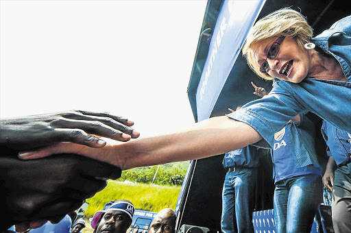 REACHING OUT: Helen Zille at the launch of the DA's election campaign for Mpumalanga in Nelspruit on Saturday. She had her hair sprayed blue for Cansa's Shavathon