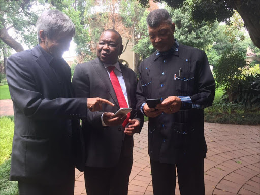 Higher Education Minister Blade Nzimande with university vice chancellors Adam Habib from Wits (left) and UJ's Ihron Rensburg (right).